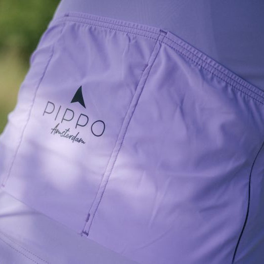 Professional lila Rennradtrikot| Reflektierendes Design|Reflektierendes Design für bessere Sichtbarkeit und zusätzliche Sicherheit bei schlechten Lichtverhältnissen.