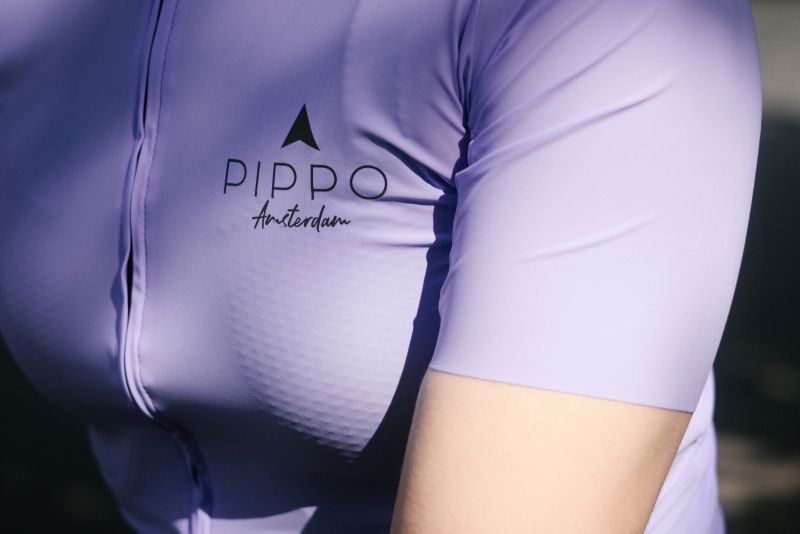 Professional Rennradtrikot fuer Damen | Laser Cut Armabschlüssen| Lila PIPPO Rennradtrikot für Damen, kurzärmeliges, eng anliegendes Radsporttrikot mit Laser-Cut-Armabschlüssen