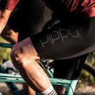 PIPPO De Ronde Bib short side view on the bike 